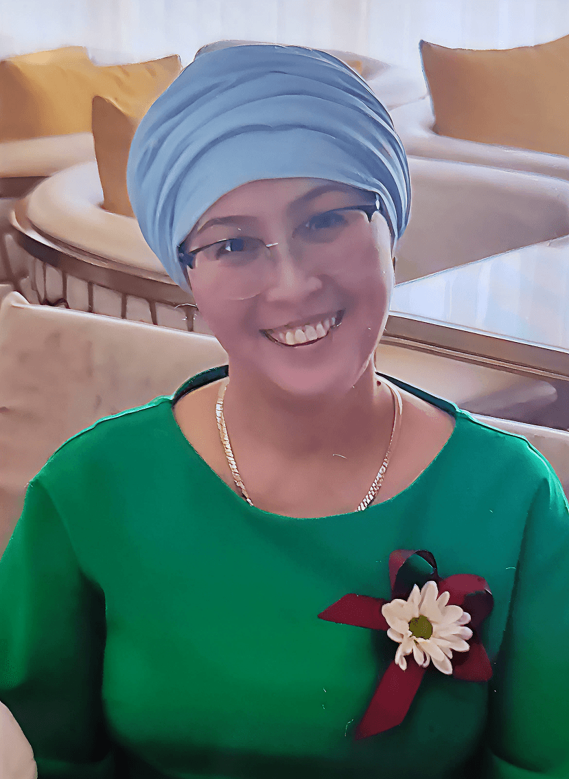 woman in black long sleeve shirt standing near brown wooden shelf